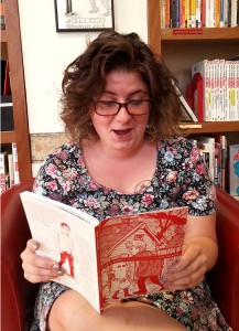 Anna Sellheim reading Youth is Wasted by Noah Van Sciver.