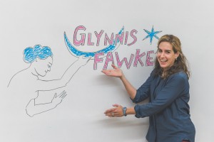 Glynnis Fawkes with her name board drawn by Luke Howard