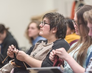Attentive and knitting (Hedj and Kotaline Jones).