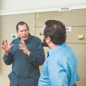 Hal Mayforth is explaining something in depth to Benjamin Wright-Heuman ('16).