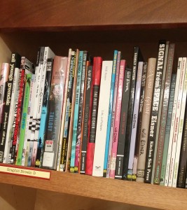Eisner books on the shelf at the Schulz Library.
